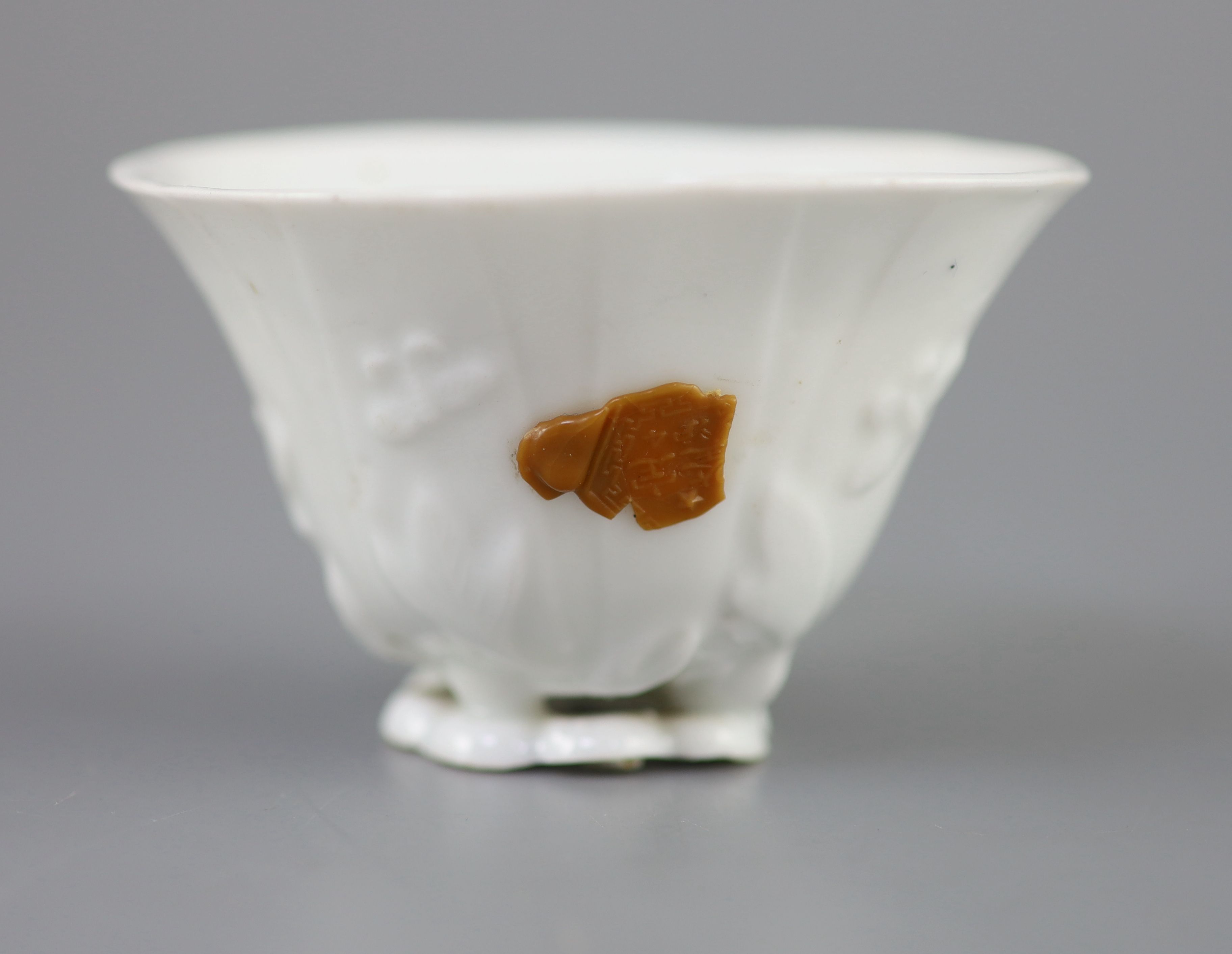 A Chinese Dehua blanc de chine libation cup, 5.3cm high